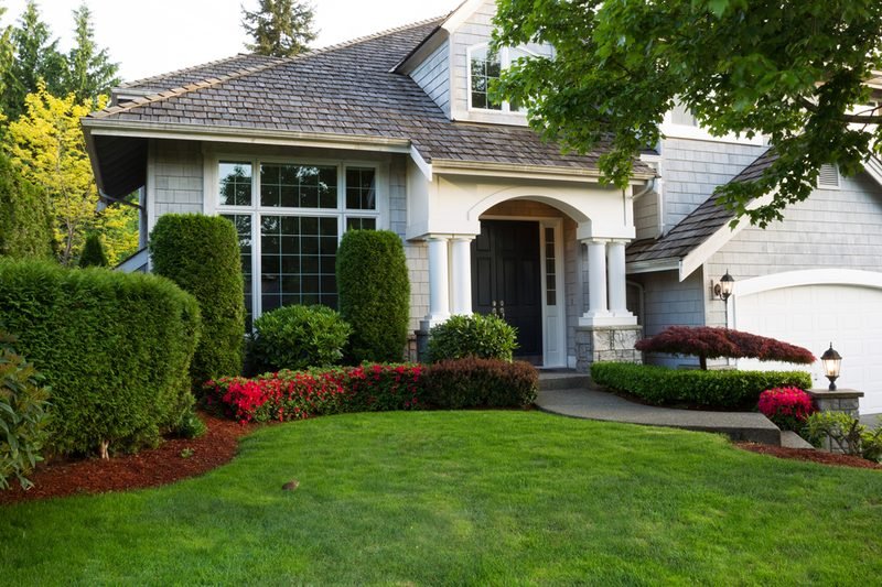 Well-kept Arizona home exterior with manicured landscaping